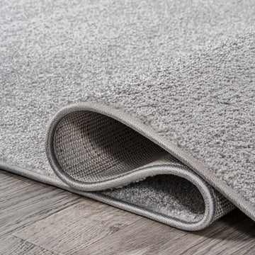 Haze Solid Low-pile Area Rug Light Gray